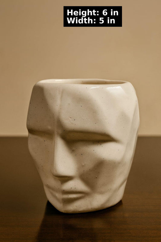 Ceremic face Planter